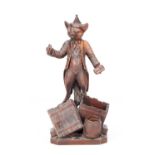 A BLACK FOREST CARVED WOOD FOX CIGAR STAND