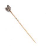 A FINE EDWARDIAN DIAMOND AND RUBY GOLD FOX TIE PIN