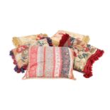 A COLLECTION OF FIVE 17/18TH CENTURY EMBROIDERED CUSHIONS