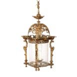 A 19TH CENTURY GILT BRASS CYLINDRICAL HANGING HALL LANTERN