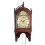 A RARE GEORGE III FIGURED MAHOGANY HOODED VERGE WALL CLOCK WITH ALARM BY ELLICOTT, LONDON