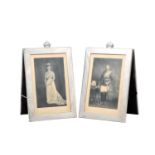 A FINE PAIR OF EARLY 20TH CENTURY SILVER FRAMED SIGNED ROYAL PHOTOGRAPHS OF KING GEORGE V AND QUEEN
