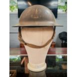 Original WWII Polish/British made Helmet dated 1940 with its original finish and the yellow eagle of