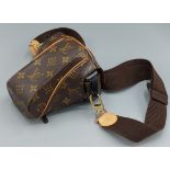 Louis Vuitton, a SLR camera case made on commission complete with Canon EOS 600 camera with