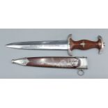 A German WWII Third Reich SA Dagger, the wooden handle inset Eagle and SA insignia, the double edged