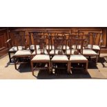 A harlequin set of fourteen Chippendale style dining chairs to include two armchairs