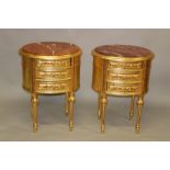 A PAIR OF GILTWOOD OVAL SHAPED THREE DRAWER BEDSIDE TABLES, with rouge marble tops. 2ft 3ins high