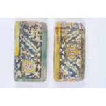 TWO 17TH - 18TH CENTURY PERSIAN SAFAVID BORDER TILES. 21cms x 11cms.