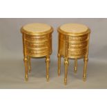 A PAIR OF GILTWOOD CIRCULAR THREE DRAWER BEDSIDE TABLES, with cream marble tops. 2ft 3ins high x 1ft