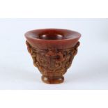 A GOOD CHINESE CARVED HORN LIBATION CUP. 13cms high.