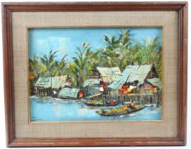 KITILERK MUHUMMAD (1944) Thai river village scene oil on canvas signed 29 x 42cm