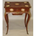 A 19TH CENTURY FRENCH KINGWOOD WORK TABLE, with oval porcelain panel and ormolu mounts, the rising