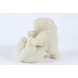 A CARVED WHITE HARDSTONE GROUP OF TWO PLAYFUL BEARS. 16cms high.