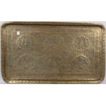 A LARGE ANTIQUE PERSIAN BRASS TRAY, QAJAR DYNASTY. 23ins x 39ins