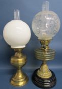 Decorative brass oil lamp on ceramic base with yellow glass reservoir and etched glass dome &