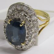 18ct gold diamond and sapphire double halo ring, ring size V/W, total weight 10g, set with central
