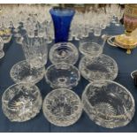 Various large crystal glass items including an ice pail, basket bowls, fruit bowls & a golf trophy