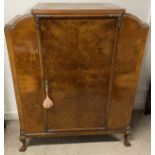 1920's drinks cabinet by Merryweather & Son of London in burr walnut veneer on cabriole legs with