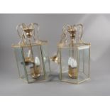 A pair of brass framed hexagonal lanterns, 8" wide x 16" high