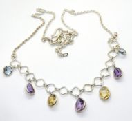 A 925 silver necklace having various col