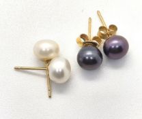 Two pairs of pearl and yellow metal stud earrings, one butterfly back stamped 14k.