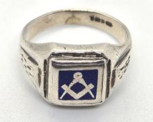 A Masonic blue enamel and silver ring having compass design, Birmingham hallmark, size O.