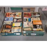 A collection of paperback classic books by D H Lawrence, Tolkien, Asimov, Dylan Thomas and others