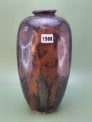 A WMF bronze ovoid vase with silvered decoration of trees.   H 31cms.