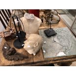 A moulded glass panel, a classical bust, a cuckoo clock, a wooden winged angel's head, etc