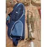 A B&M Champion trumpet with a Ritter canvas carrying case