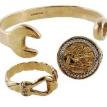 9ct hallmarked gold to include a spanner bangle, a buckle-type ring, size R, and a St. George