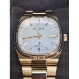 Bulova Super Seville precisionist gentleman's wristwatch. The 38-millimetre gold-tone PVD