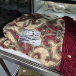 A wine red fringed curtain pelmet 235 x 60cms