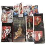 STAR WARS: A collection of various vintage and contemporary action figures and toys