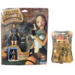 A cased and carded Lara Croft [Tomb raider] action figure, together with a carded Jack Sparrow [