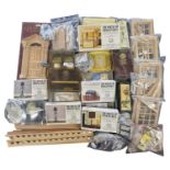 A large collection of various dolls house and dolls house furniture making supplies