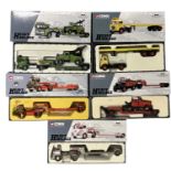 A mixed lot of various boxed Corgi Heavy Haulage vehicles