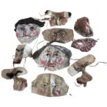 1890s-1920s A Collection of HALLOWEEN GROTESQUE LINEN MASKS. Approx 9 full and part masks, made from