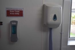 A paper towel dispenser together with a soap dispenser
