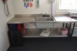 A stainless steel food preparation/Wash area with central sink, under shelf and splash back, width