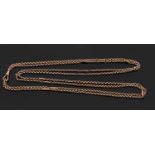 A 9ct guard chain, with long sections of belcher link chain interspaced with fancy rectangular