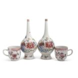 A pair of bottle shaped vases with Famille Rose decoration together with two Chinese porcelain