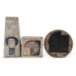 Three pieces of Troika pottery comprising a coffin vase, disc vase and further square section