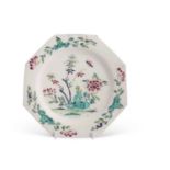A Bow porcelain octagonal shaped plate, circa 1760, decorated in Famille Rose and Famille Vert
