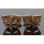 A pair of 9ct theatrical comedy / tragedy mask cufflinks, set with ruby and sapphire eyes, each 23mm