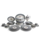An extensive Wedgwood dinner service and coffee service in the Florentine pattern, over 150 pieces