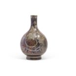Pilkington Lustre Vase by Richard Joyce of bulbous form decorated with a berry and leaf design