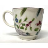 A Bow porcelain coffee cup circa 1760, Famille Rose decoration