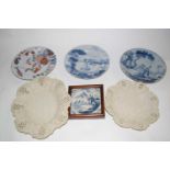 Three 18th Century English Delft plates, two with blue and white decoration, a further plate with