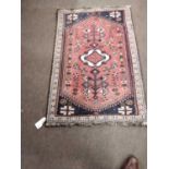 Small Hamadan rug or prayer mat decorated with a large central red lozenge, 102 x 75cm